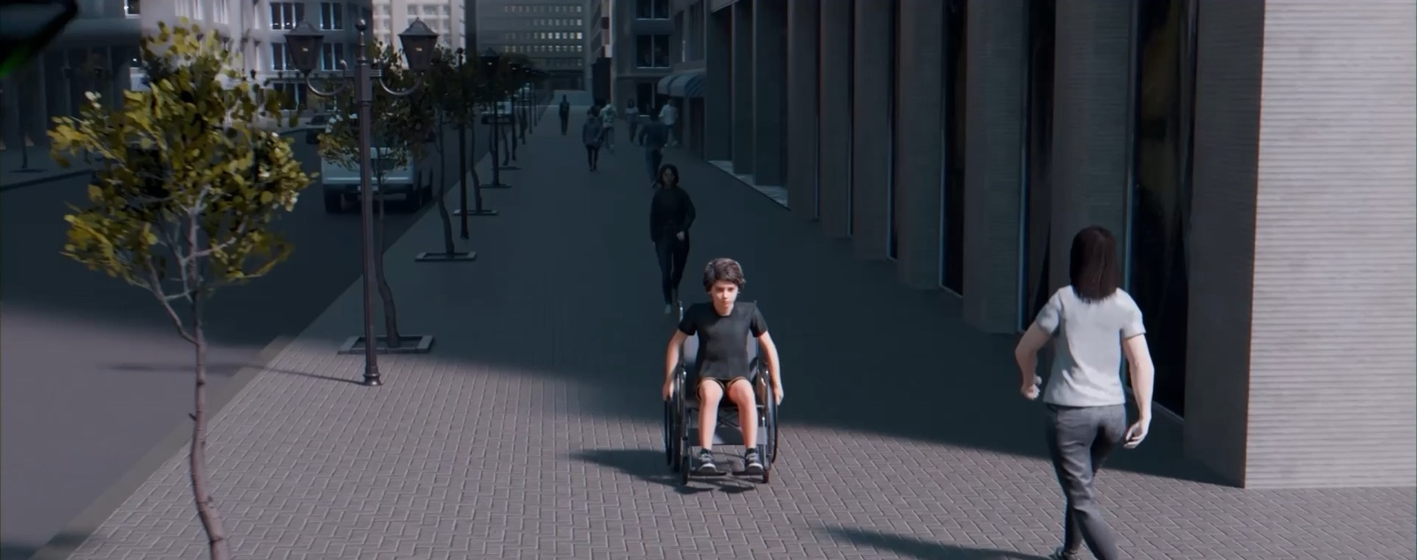 A manual wheelchair user on a city sidewalk
